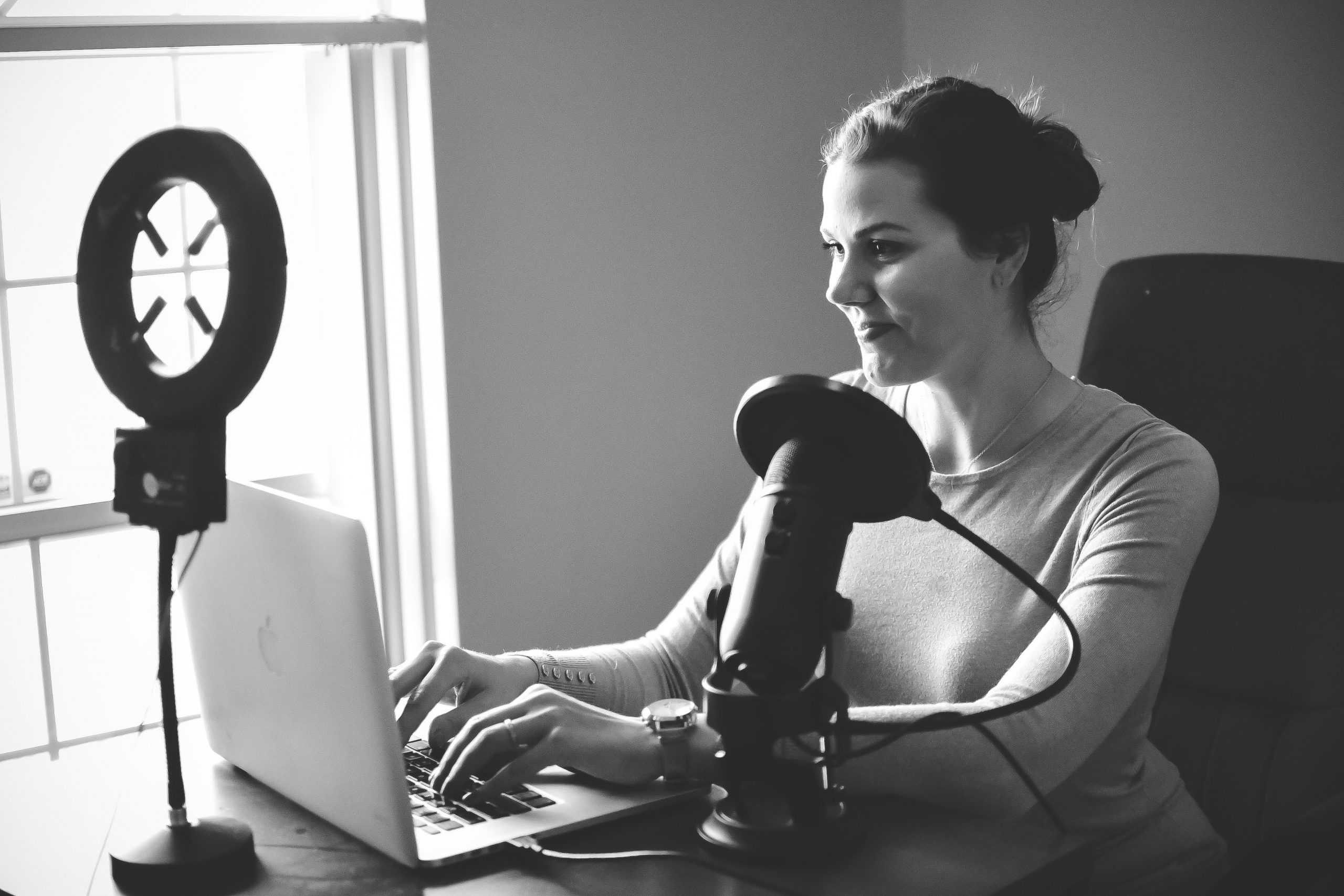 Rachel recording her podcast